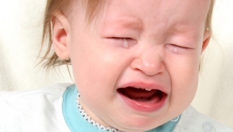 Does Teething in Infants Cause Pain and Illness?